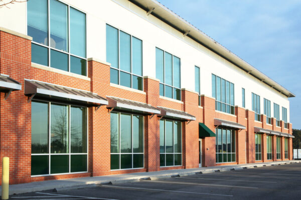 Diminishing perspective view of a modern small office building.